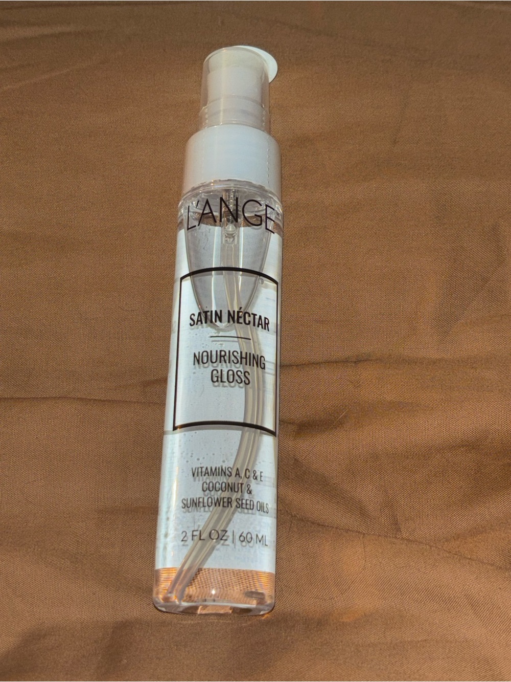 L'ange Satin Néctar Nourishing Gloss, a popular lightweight hair serum designed
